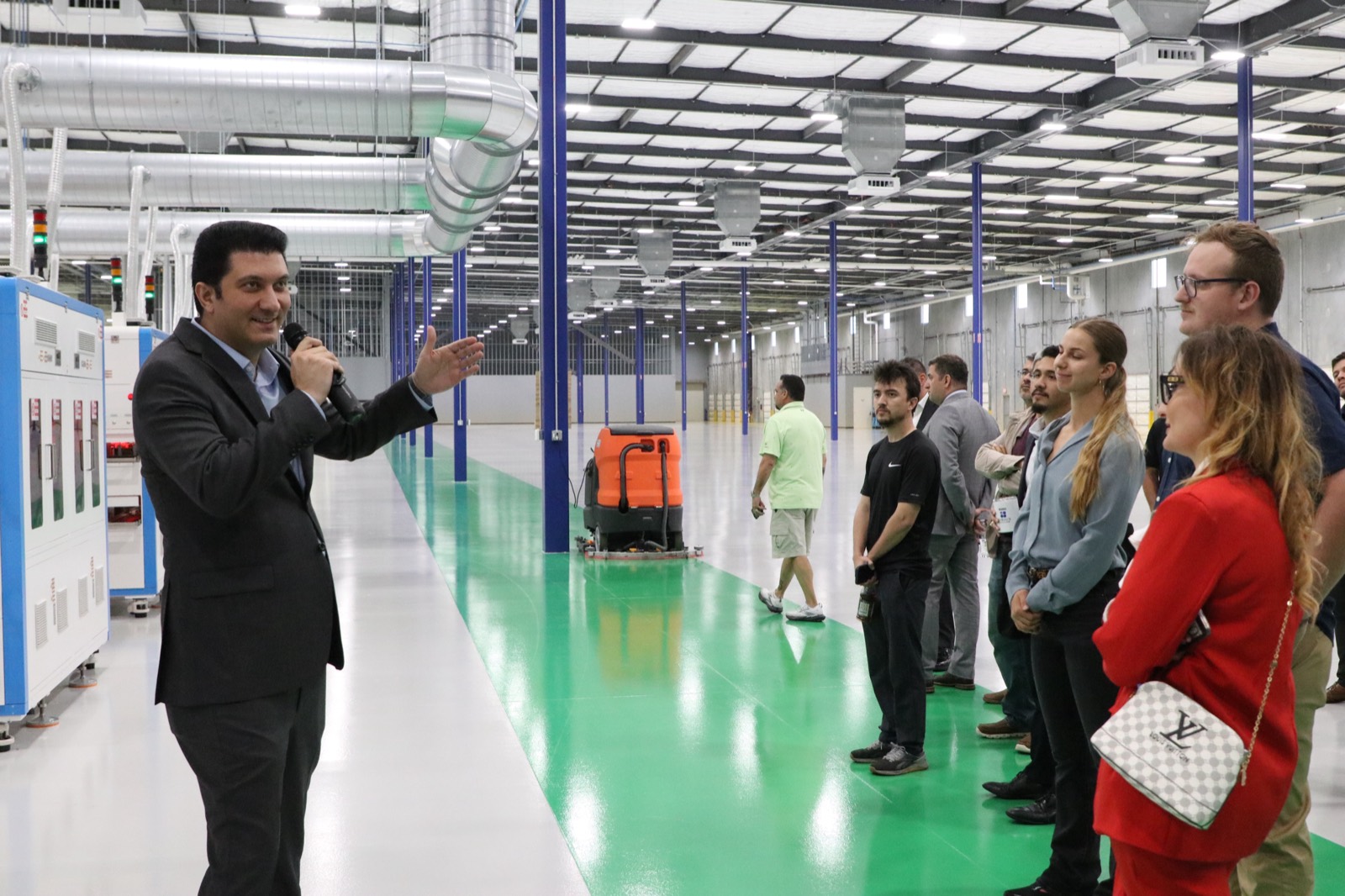 Visitors touring the Sirius PV assembly facility